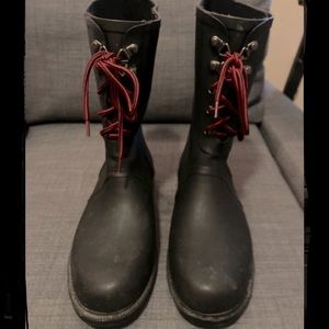 Black rain boots with red/black accent laces